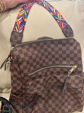 Checkered Brown Canvas Backpack with Red Stripe Strap